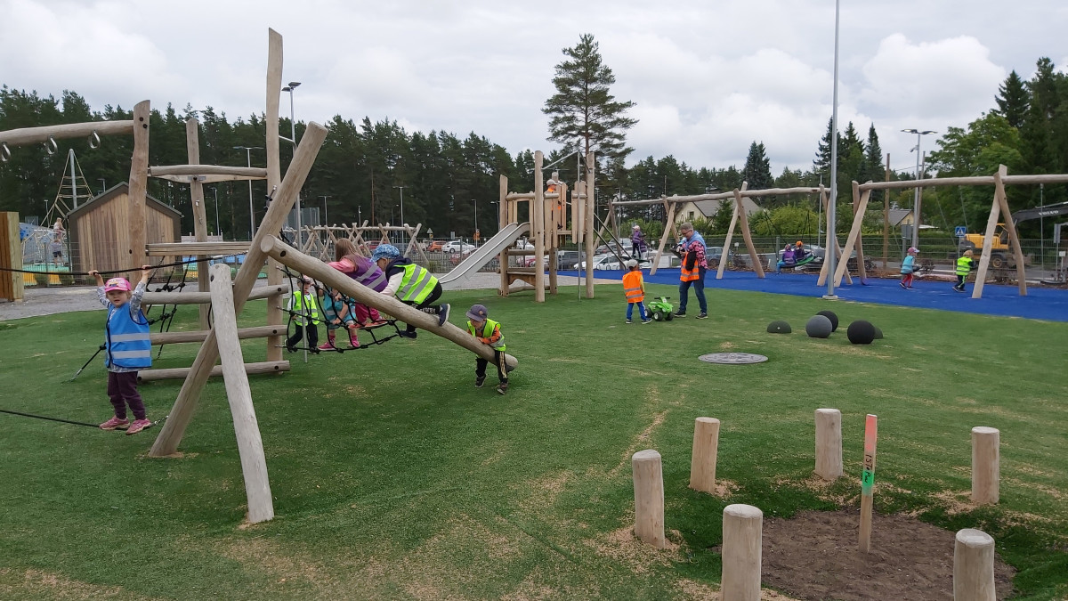 playground equipment and children playing outside.
