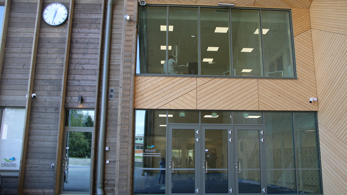 Large exterior doors in the school building.