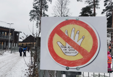 An anti-bullying sign in the yard of the Mansikkala school center.