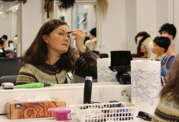 Actress Hanna Kaskela applying make-up.