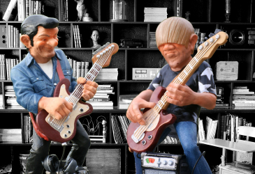 Dolls playing guitar and bass.