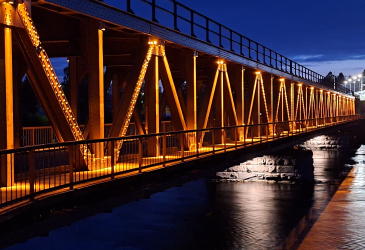 Mansikkakoski's old railway bridge in the evening lighting at a blue moment in Imatra.