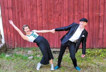 Laura Sivonen and Miika Heiniluoto holding hands.